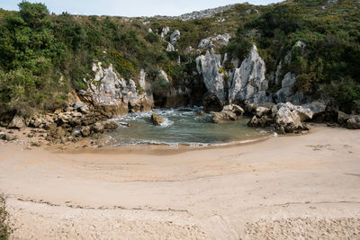 Scenic view of beach against mountain