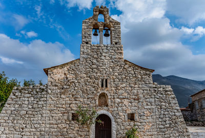 Low angle view of historic building against sky