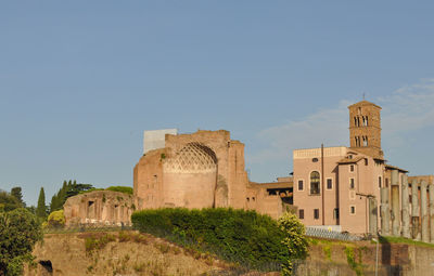 Low angle view of old ruins against clear sky