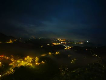 Aerial view of city at night