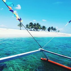 Scenic view of calm sea against blue sky