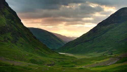 Scenic view of mountains against sky during sunset