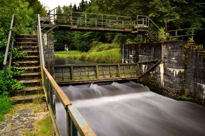 View of dam and bridge in water