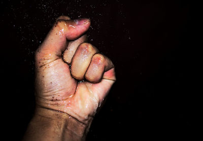 Close-up of human hand in water