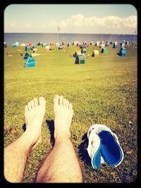 People relaxing on beach