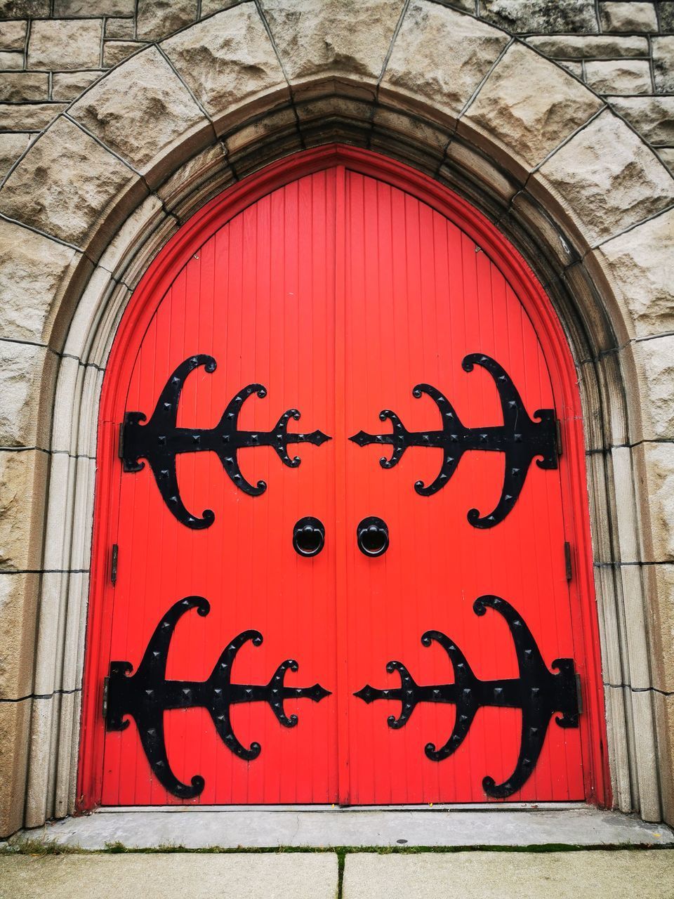 CLOSED DOOR OF RED WALL