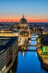 Illuminated buildings in city