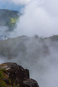 Scenic view of volcanic mountain against sky