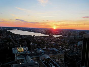 High angle view of city at sunset