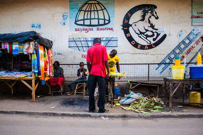Rear view of woman walking in city