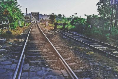 Railway tracks against clear sky