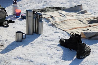 High angle view of picnic on snow covered land