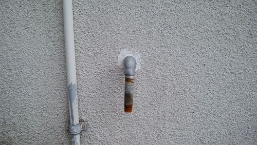 Close-up of pipe on wall