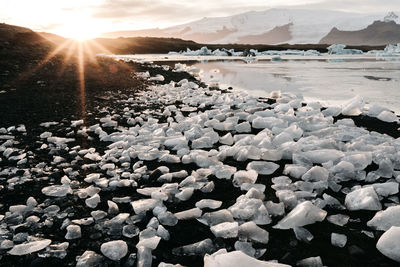 Scenic view of sea against sky during winter