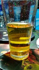 Close-up of beer in glass on table