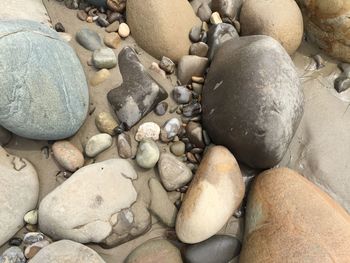 Full frame shot of pebbles at beach