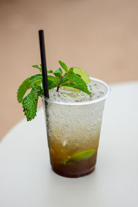 Close-up of drink against white background