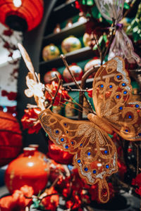 Close-up of butterfly on christmas decoration