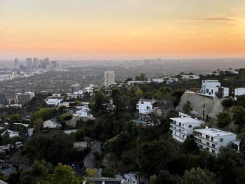 High angle view of townscape against sky during sunset