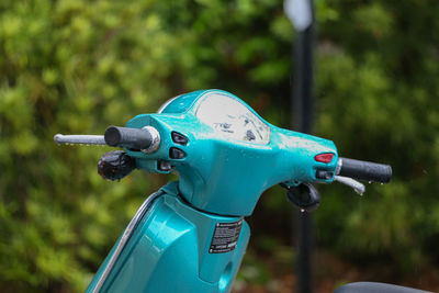 Close-up of coin-operated binoculars against blurred background