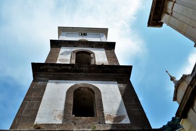 Low angle view of bell tower against sky in sorrento