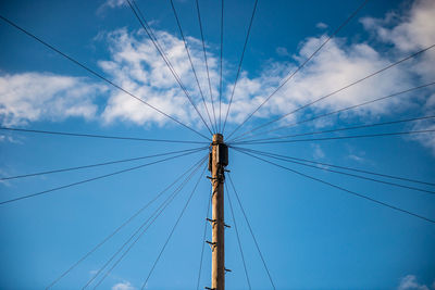 Telephone pole with wires connecting people