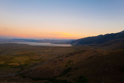 Scenic view of landscape against sky during sunset