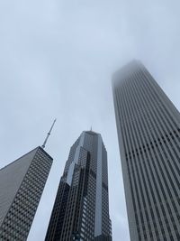 Low angle view of skyscraper against sky