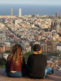 Woman looking at cityscape