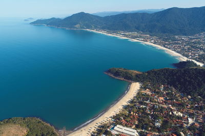 High angle view of sea and cityscape