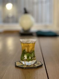 Close-up of tea in glass on table