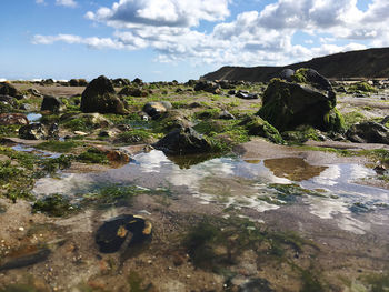 Scenic view of rocks against sky