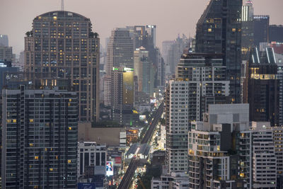 Modern buildings in city against sky