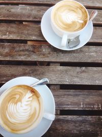 High angle view of cappuccino on table