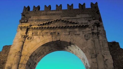 Low angle view of old ruin against clear sky