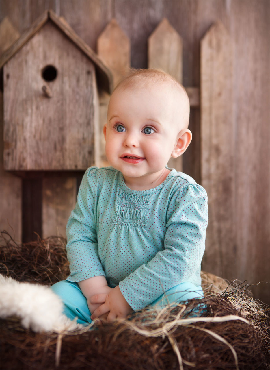 PORTRAIT OF CUTE SMILING BOY