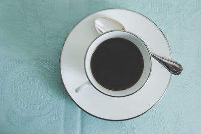 High angle view of coffee cup on table