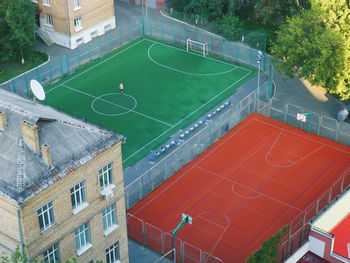High angle view of soccer field and buildings