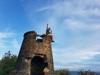 Low angle view of fort against blue sky