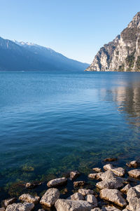 Scenic view of sea against clear blue sky