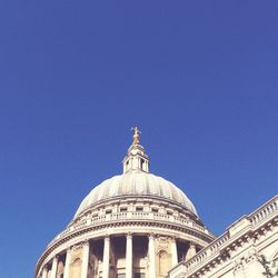 Low angle view of tower against clear blue sky