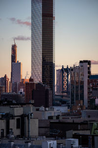 Cityscape against sky during sunset