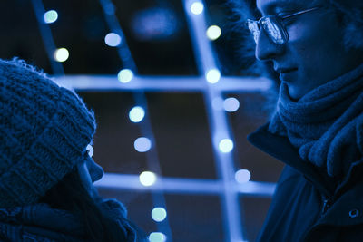 Close-up of couple standing outdoors