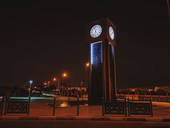 Illuminated buildings in city at night