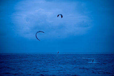 Scenic view of sea against blue sky