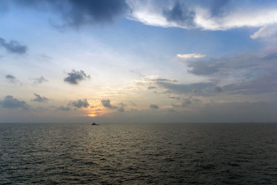 A lone anchor handling tugboat maneuvering at offshore terengganu oil field