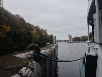 View of bridge over river in city