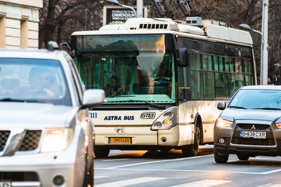 Cars on road in city