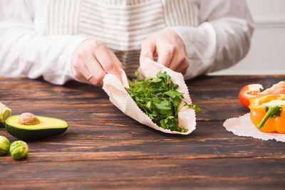 Midsection of woman preparing food