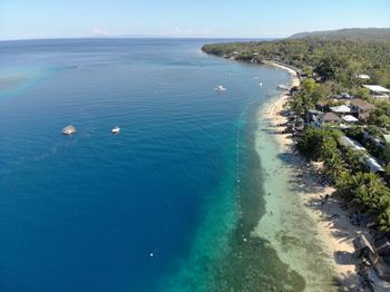 High angle view of sea shore against sky